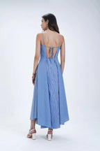 Robe mi-longue évasée en coton à œillets