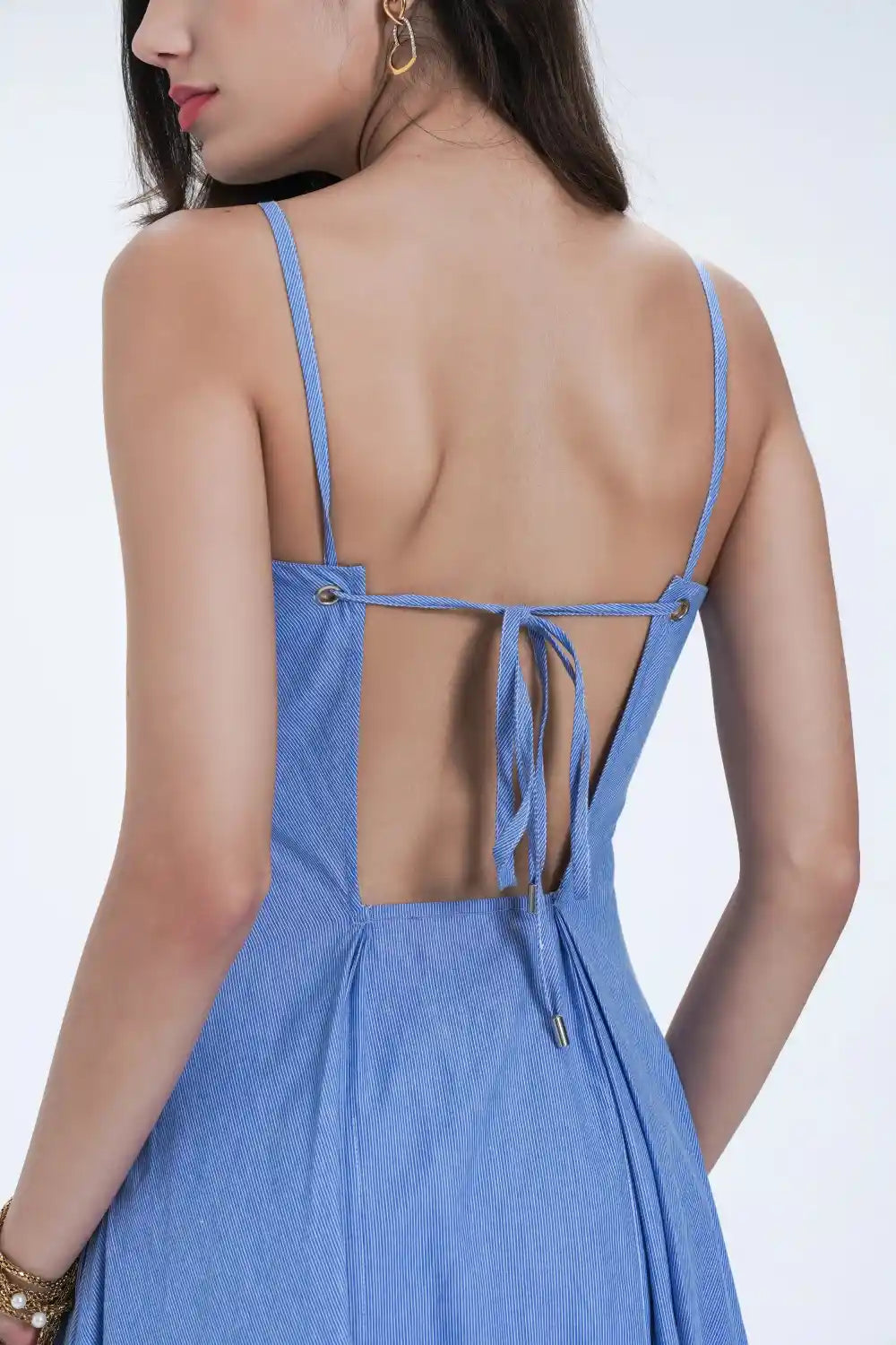 Robe mi-longue évasée en coton à œillets