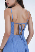 Robe mi-longue évasée en coton à œillets